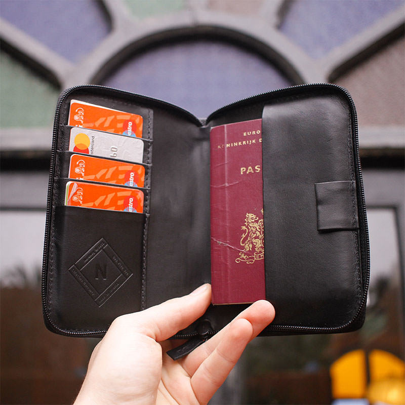 Nordweg black leather cardholder open with orange card detail