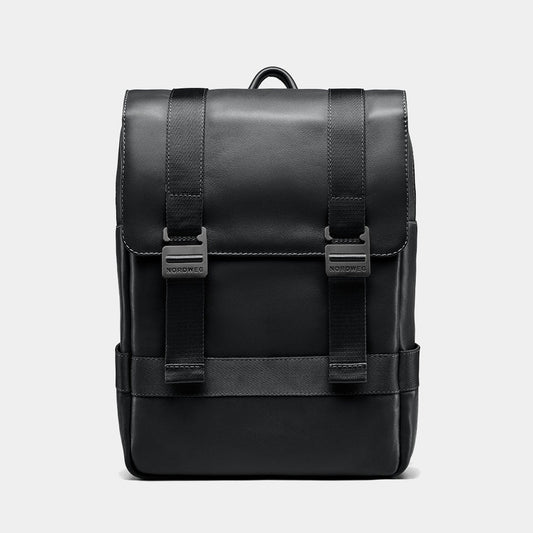 Nordweg Dolomites leather travel backpack in black, front view with flap and metal buckles