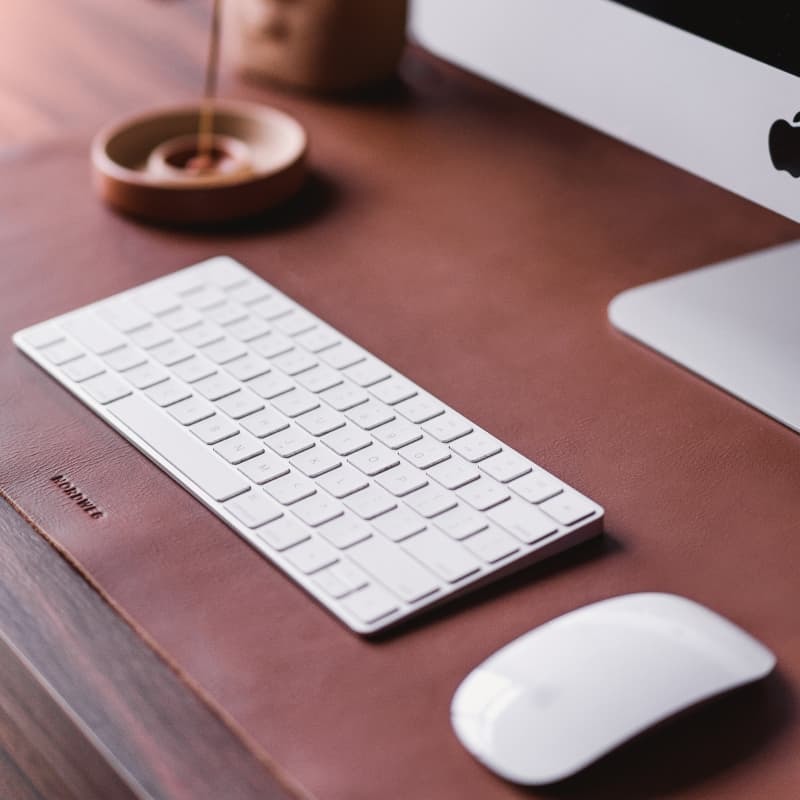 Nordweg leather desk pad workspace with keyboard and mouse