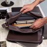 Open coffee Nordweg Dolomites leather satchel showing books and documents inside, SKU NW105.IC, GTIN 7898571001129