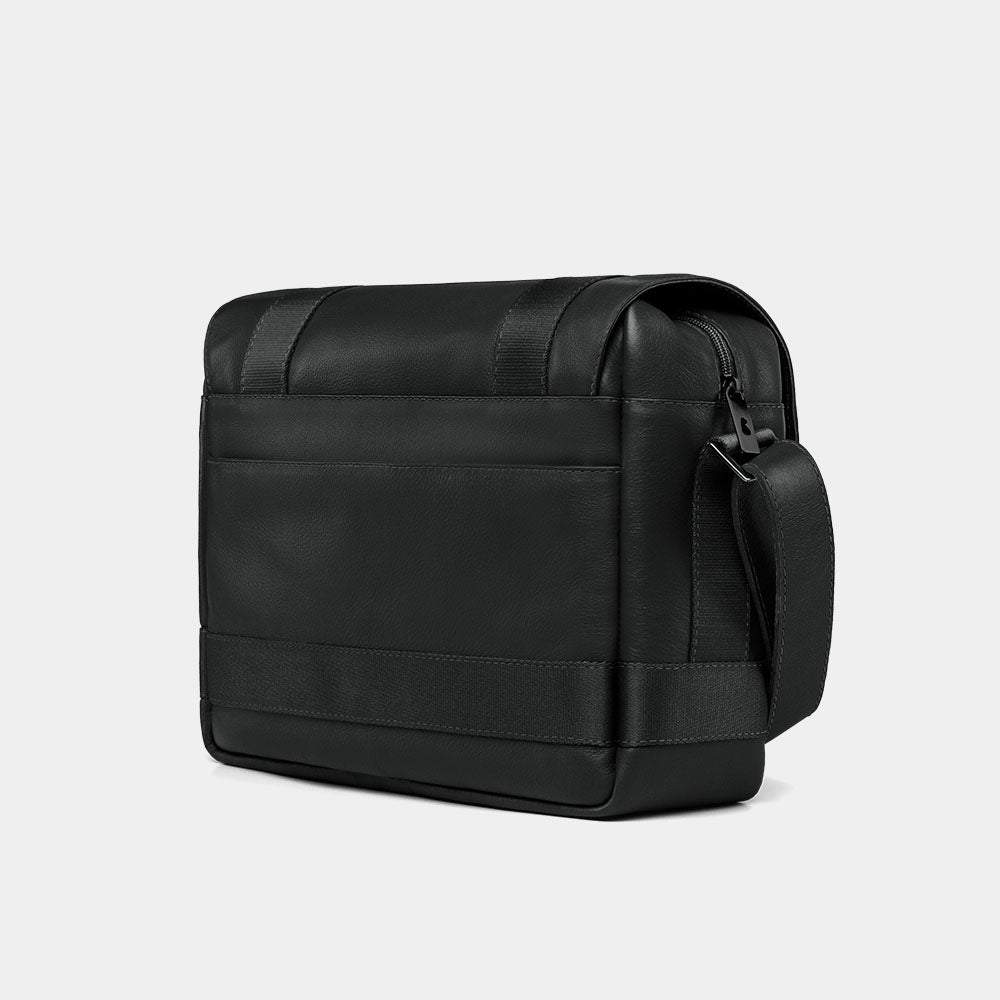 Nordweg Dolomites leather satchel shoulder bag in black, back view with zip pocket