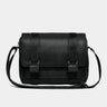 Nordweg Dolomites leather satchel shoulder bag in black, front view with buckles and strap