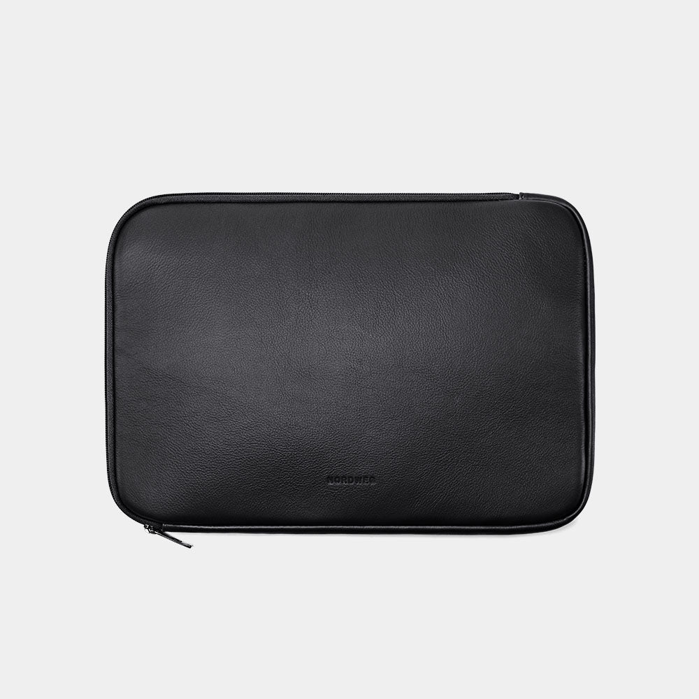 Black Dolomites leather satchel shown with matching laptop sleeve