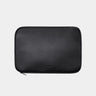 Black Dolomites leather satchel shown with matching laptop sleeve
