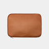 Caramel Dolomites leather satchel shown with matching laptop sleeve