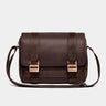 Nordweg Dolomites leather satchel shoulder bag in coffee, front view with buckles and strap