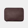 Coffee Dolomites leather satchel shown with matching laptop sleeve