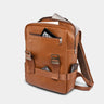 Caramel Dolomites leather travel backpack angled view with documents and front zip pocket
