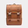 Nordweg Dolomites leather travel backpack in caramel, front view with flap and metal buckles