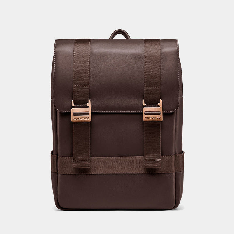 Nordweg Dolomites leather travel backpack in coffee, front view with flap and metal buckles