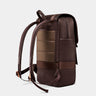 Nordweg Dolomites leather travel backpack in coffee, side view with padded back and shoulder straps