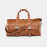 Nordweg Dolomites leather weekender travel bag in caramel, front view with shoulder strap