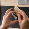 Black Nordweg Flint leather cardholder wallet held open with cash in the pocket, SKU NW109.IP, GTIN 7898571001235
