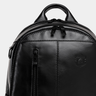 Close-up of the top handle, front zippers, and Nordweg crest on the Gramado Laptop Backpack in Black.