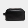 Nordweg Gramado leather dopp kit travel toiletry bag in black, front view with side handle