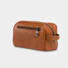 Nordweg Gramado leather dopp kit travel toiletry bag in caramel, side view with front zip pocket