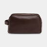 Nordweg Gramado leather dopp kit travel toiletry bag in coffee, front view with side handle