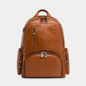 Nordweg Gramado leather laptop backpack in caramel, front view with vertical zip pocket and side pockets