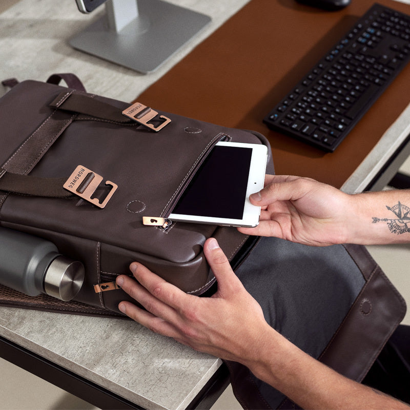 Nordweg leather desk accessories with laptop and hands in a workspace lifestyle photo