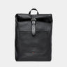 Nordweg Legacy leather backpack in coal, front view with roll-top and metal buckle