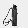 Nordweg Legacy leather backpack in coal, side profile with shoulder straps