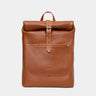 Nordweg Legacy leather backpack in cognac, front view with roll-top and metal buckle