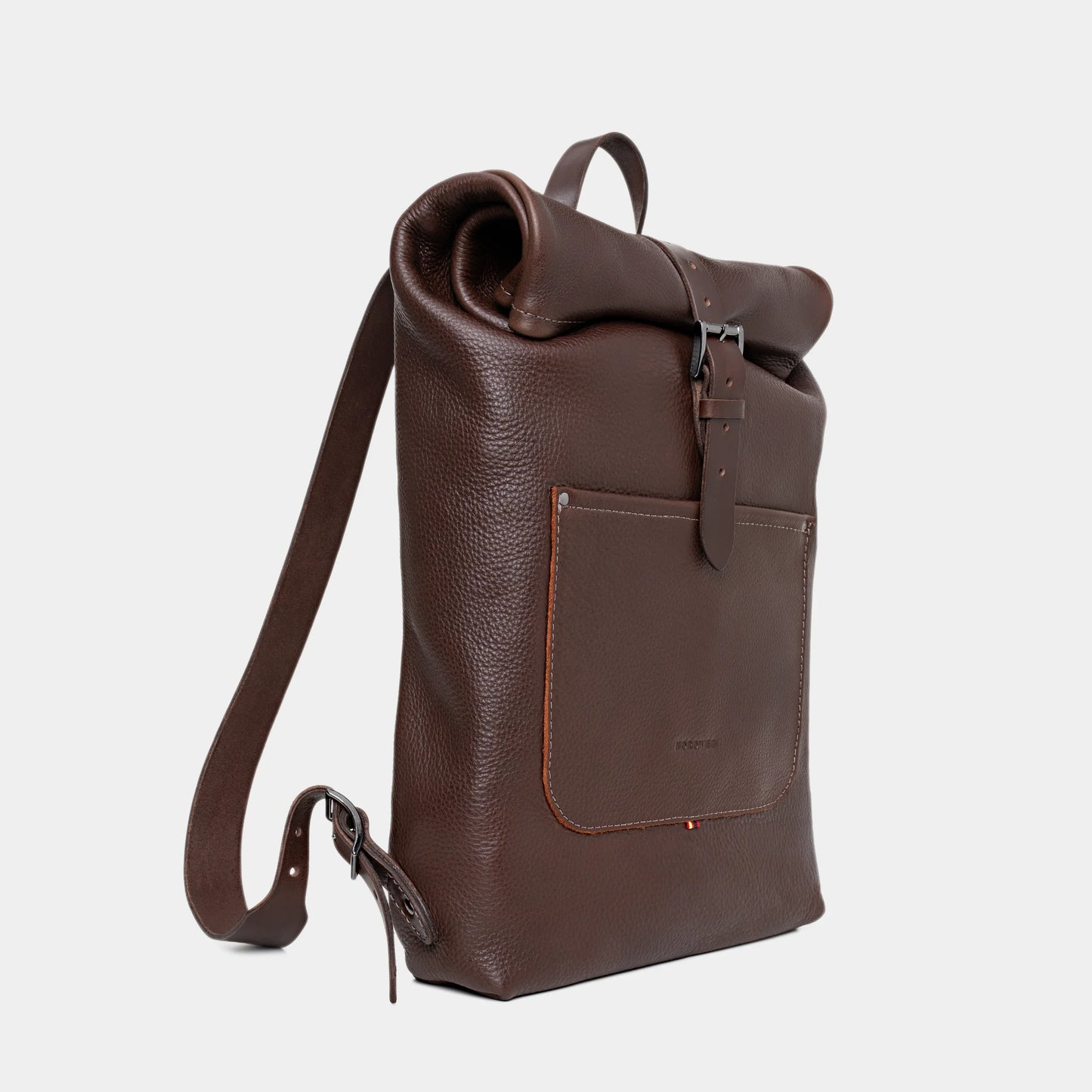 Nordweg Legacy leather backpack in espresso, angled front view with roll-top and shoulder strap