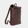 Nordweg Legacy leather backpack in espresso, angled front view with roll-top and shoulder strap
