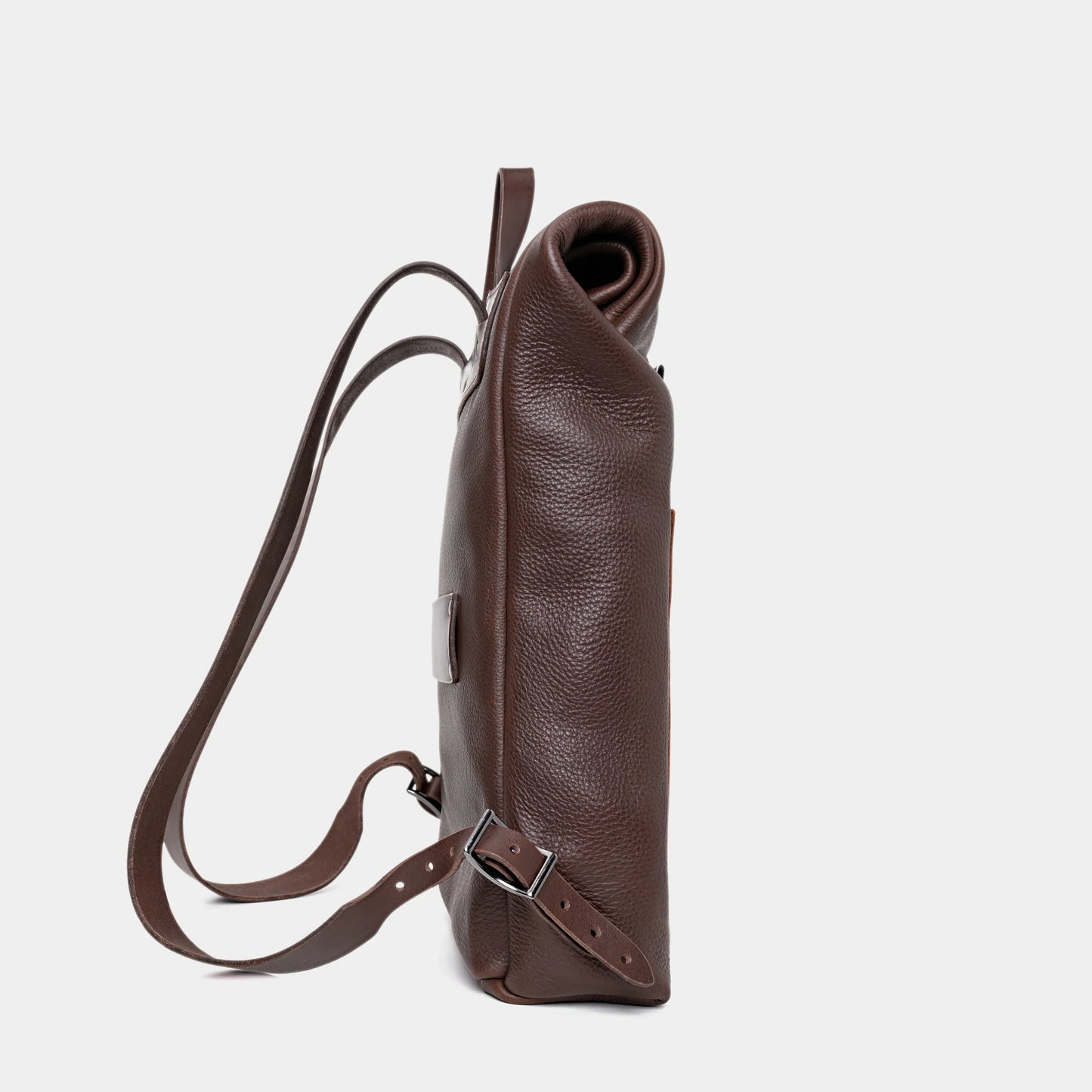 Nordweg Legacy leather backpack in espresso, side profile with shoulder straps