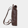 Nordweg Legacy leather backpack in espresso, side profile with shoulder straps