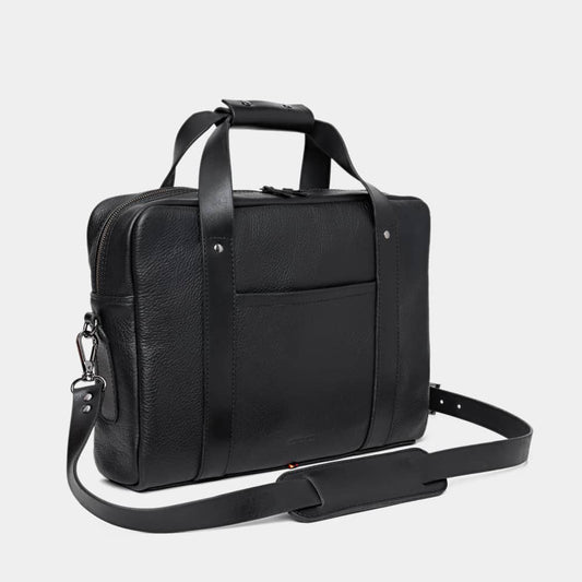 Nordweg Legacy leather briefcase laptop work bag in coal, angled front view with shoulder strap