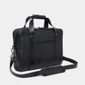 Nordweg Legacy leather briefcase laptop work bag in coal, angled front view with shoulder strap