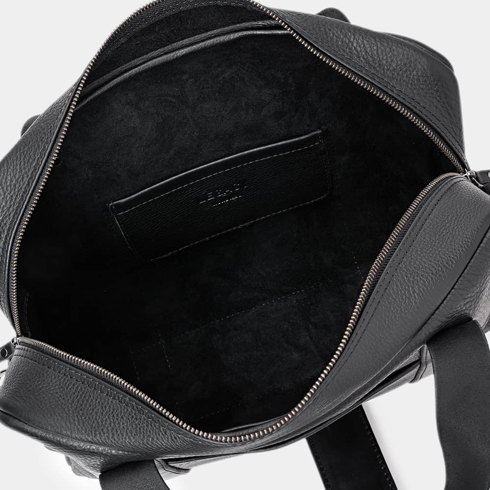 Open coal Legacy leather briefcase showing interior pocket
