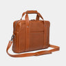 Nordweg Legacy leather briefcase laptop work bag in cognac, angled front view with shoulder strap