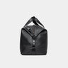 Nordweg Legacy leather duffel travel bag in coal, side end view with handle and strap