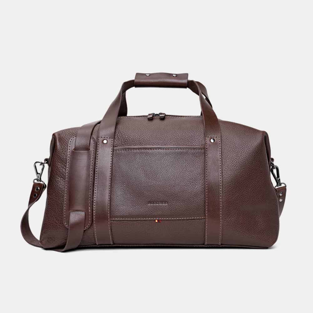Nordweg Legacy leather duffel travel bag in espresso, front studio view with handles