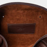 Open espresso Legacy leather duffel bag showing interior pocket