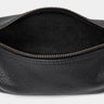 Open coal Legacy leather organizer pouch showing dark suede interior and zipper