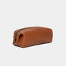 Nordweg Legacy leather organizer pouch in cognac, angled side view with zipper pull