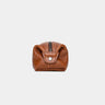 Nordweg Legacy leather organizer pouch in cognac, end view with snap tab detail