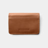 Nordweg Marco leather AirTag wallet cardholder in caramel, back view with card pocket