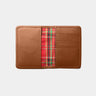 Open caramel Nordweg Marco leather AirTag wallet showing plaid interior and card slots