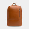 Nordweg Nomad leather laptop backpack in caramel, front view with vertical zip pocket