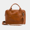 Nordweg Nomad leather briefcase laptop work bag in caramel, front view with handles and shoulder strap