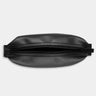 Nordweg Nomad leather dopp kit travel toiletry bag in black, top view with zipper opening