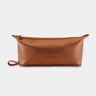 Nordweg Nomad leather dopp kit travel toiletry bag in caramel, front view with side loop