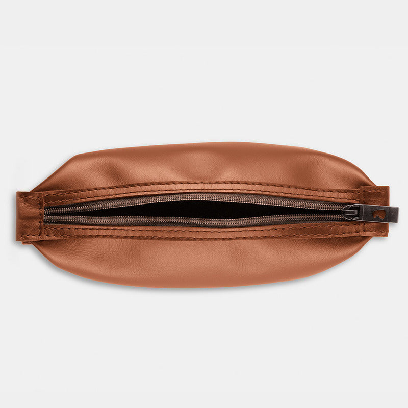 Nordweg Nomad leather dopp kit travel toiletry bag in caramel, top view with zipper opening