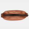 Nordweg Nomad leather dopp kit travel toiletry bag in caramel, top view with zipper opening