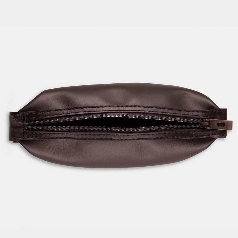 Nordweg Nomad leather dopp kit travel toiletry bag in coffee, top view with zipper opening