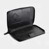 Open black Nomad leather passport wallet showing card slots and passport pocket